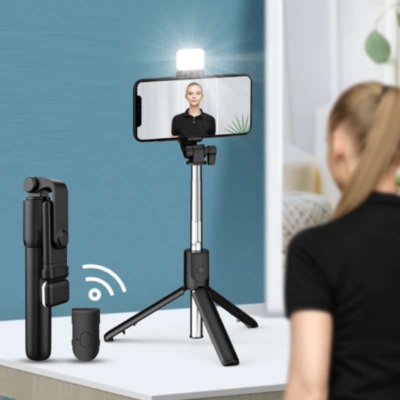 Unisex 6-in-1 Bluetooth selfie stick tripod with integrated fill light for mobile photography & video.