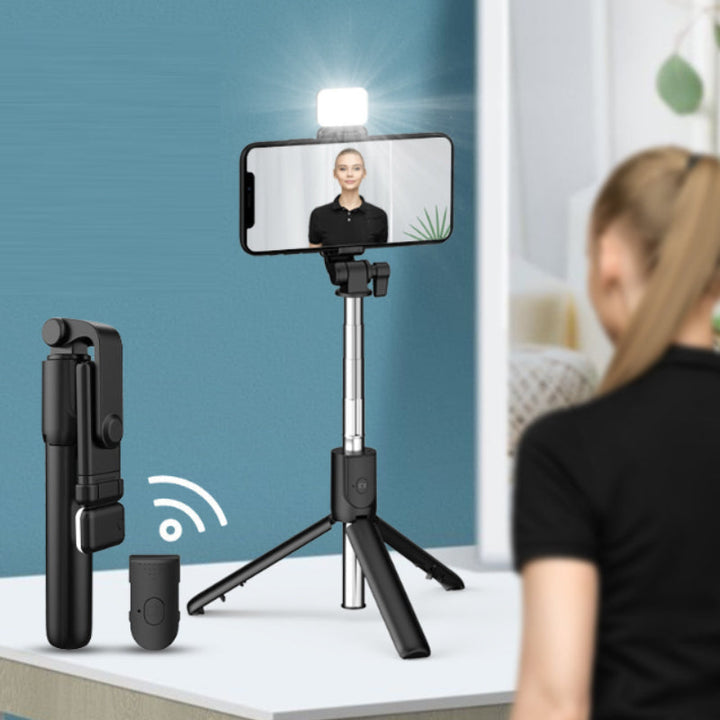 Unisex 6-in-1 Bluetooth selfie stick tripod with integrated fill light for mobile photography & video.