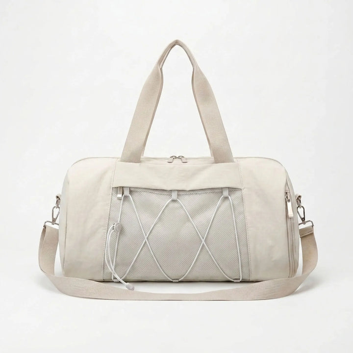 Compartment duffel bag for active lifestyles, featuring a dedicated shoe compartment, perfect for gym or sports.