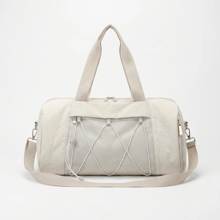 Stylish unisex workout duffel bag with spacious main compartment & side pockets for active gym-goers.