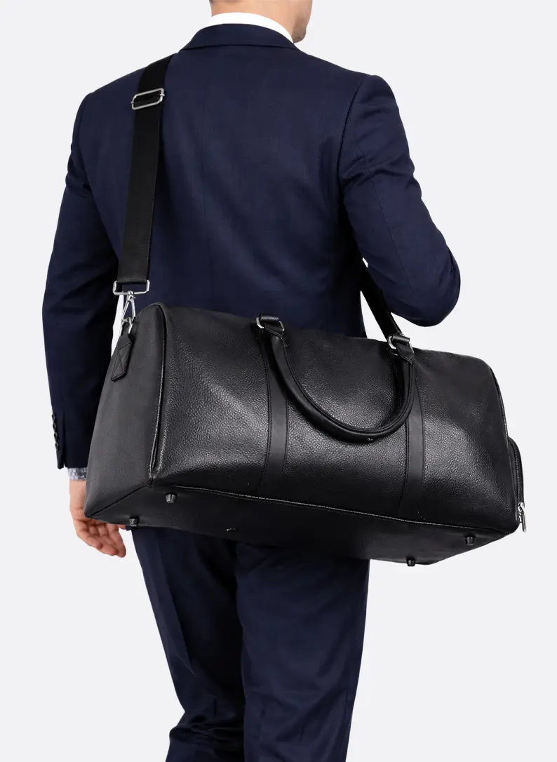 Black unisex gym and travel duffel bag with organizer pockets. Ideal carry-on weekender sports bag.