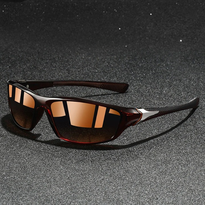 Anti-glare athletic sunglasses with UV400 protection for outdoor sports & active lifestyles. Wraparound design.