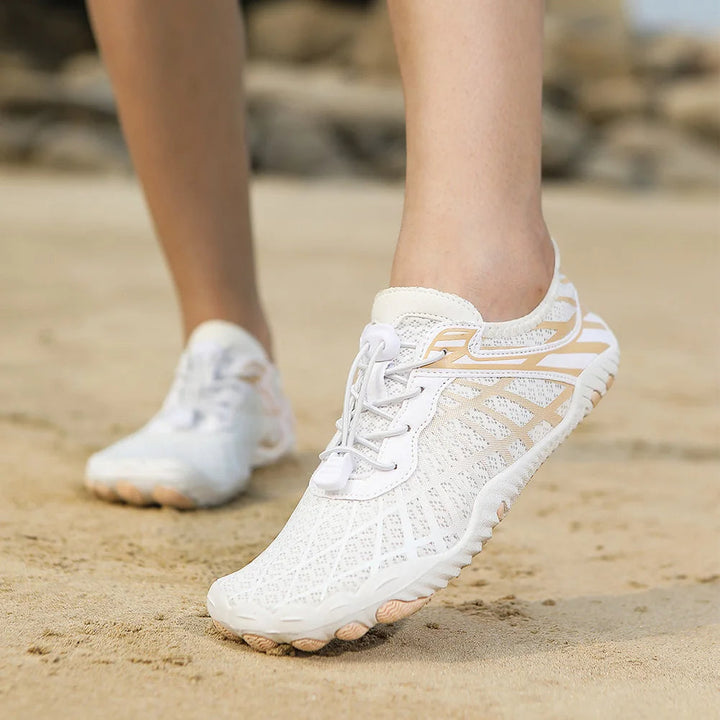 Flexible quick-drying footwear for men & women, ideal for water activities.