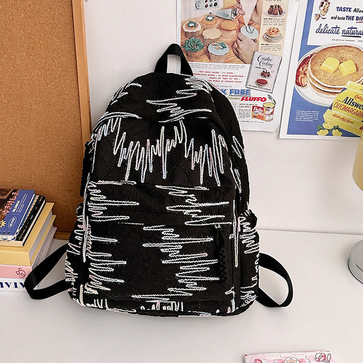 Unisex artistic patterned backpack, colorful and durable, perfect for school, travel, or everyday fashion.