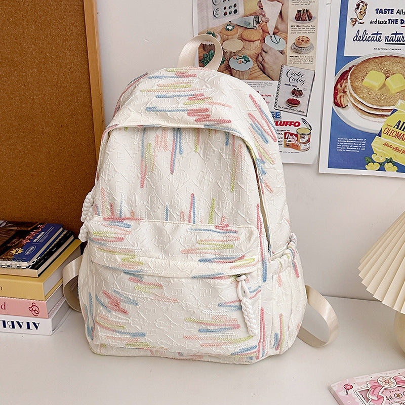 Fashionable unisex backpack with a vibrant artistic pattern. Durable travel or school bag for men and women.