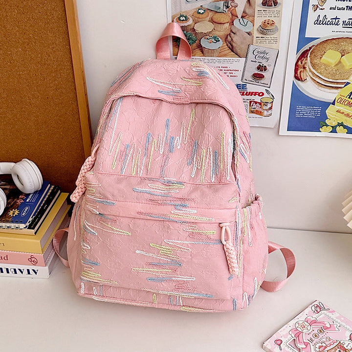 Vibrant artistic patterned school backpack for unisex use. Fashionable, colorful, and durable for daily adventures.