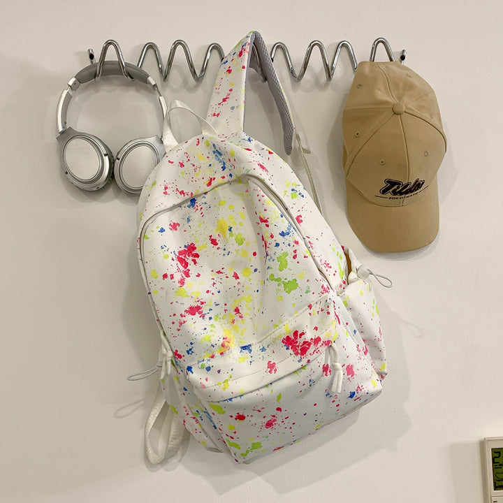 Stylish artistic splash design backpack, unisex, great for school, travel, or daily use; durable & colorful laptop bag.