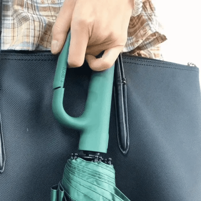 Durable unisex automatic folding umbrella, windproof and reflective, ensuring safety & dryness in any storm.