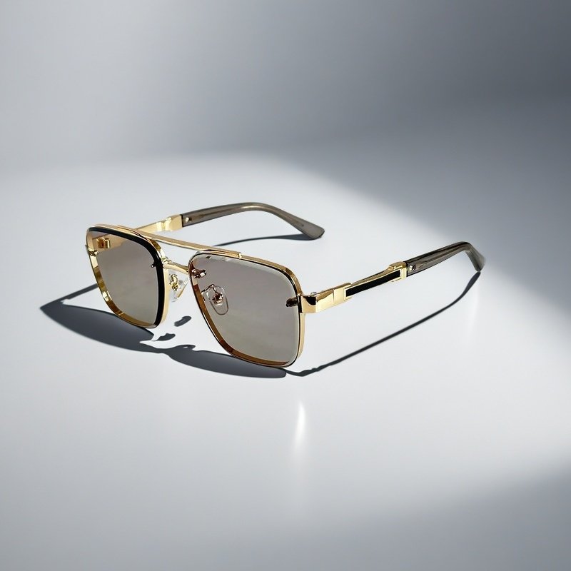 Gold-tone metal aviator square sunglasses with gradient lenses, offering stylish sun protection.