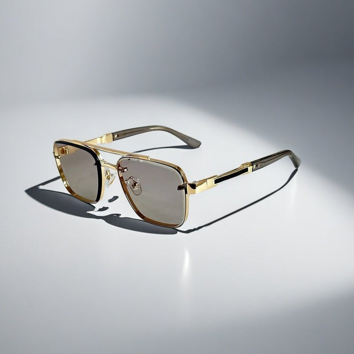 Gold-tone metal aviator square sunglasses with gradient lenses, offering stylish sun protection.