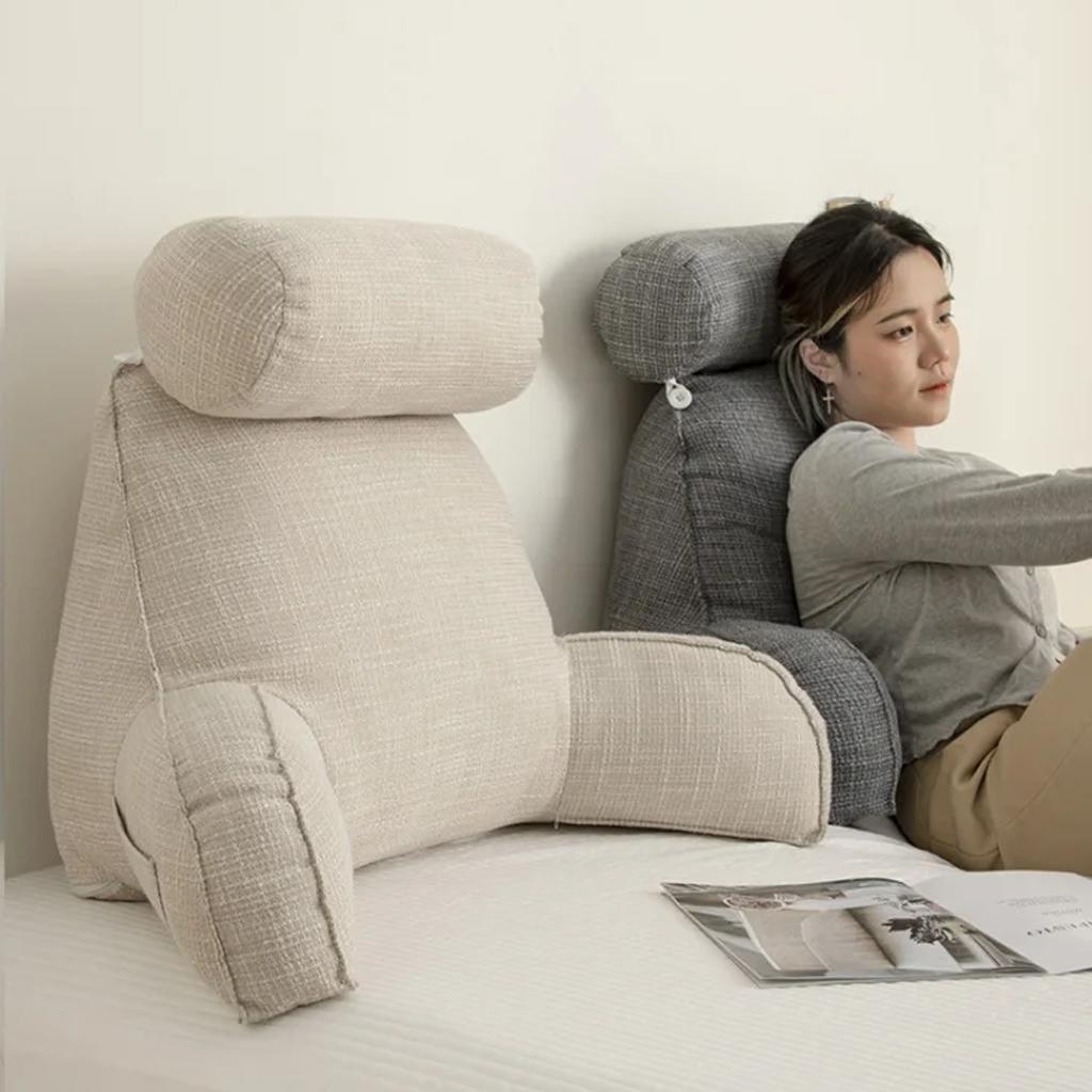 Supportive backrest pillow featuring lumbar support, comfy arms, and an adjustable headrest for relaxation.