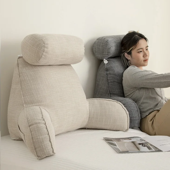 Supportive backrest pillow featuring lumbar support, comfy arms, and an adjustable headrest for relaxation.