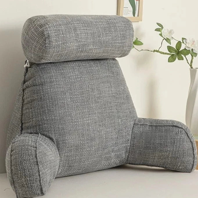 Relaxation backrest pillow with arms, adjustable headrest & lumbar support for cozy home comfort.