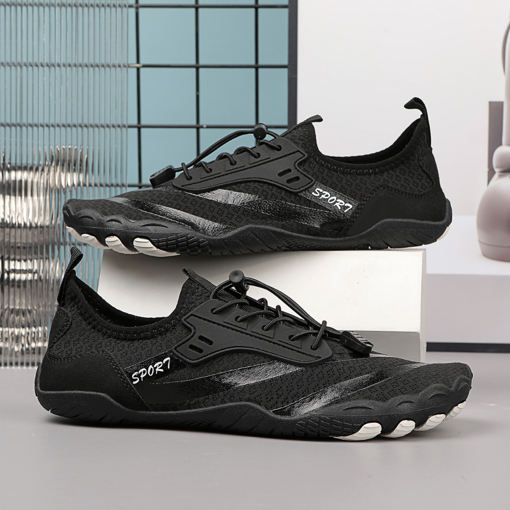 Flexible unisex barefoot sneakers, showcasing soft, breathable fabric & wide toe box for natural foot comfort.