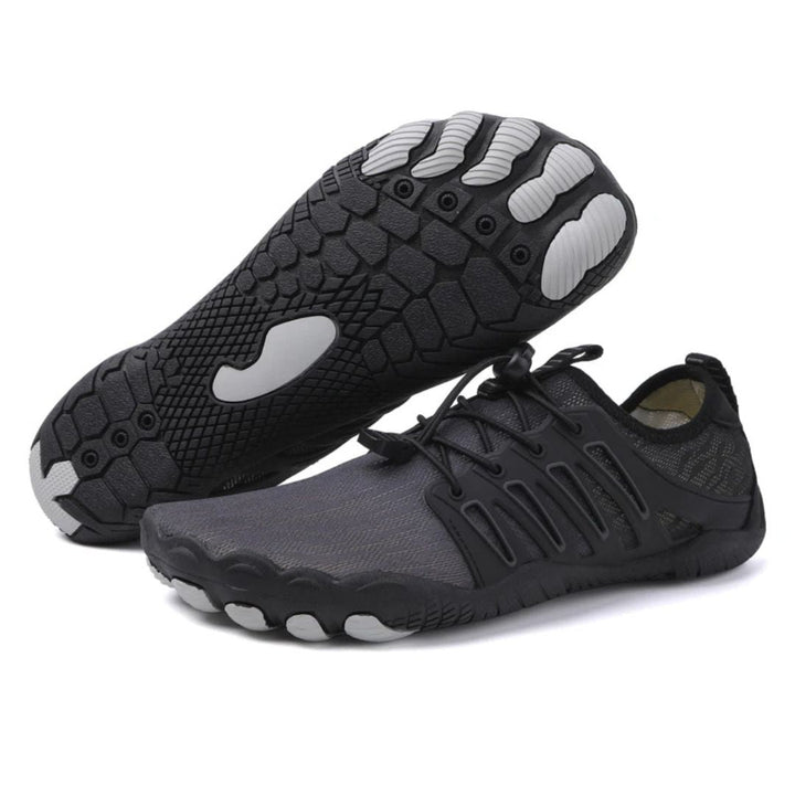 Pink unisex barefoot shoes for active lifestyle & comfort. Flexible sole, ergonomic design for natural foot health.