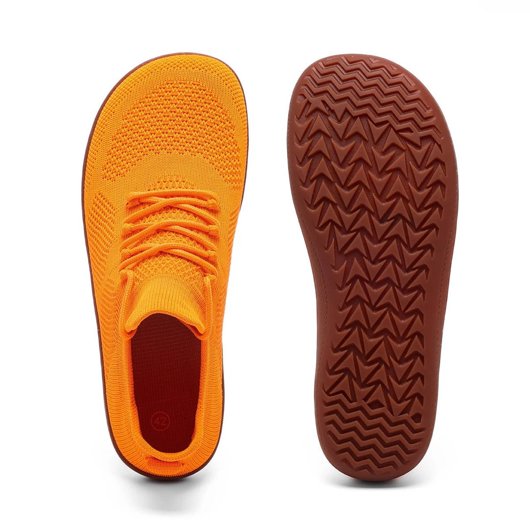 Lightweight minimalist running shoes with zero drop for natural stride. Breathable athletic footwear for men & women.