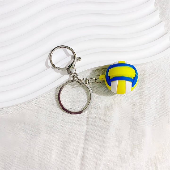 Stylish basketball charm accessory, ideal for backpacks, keys, & sports fans.