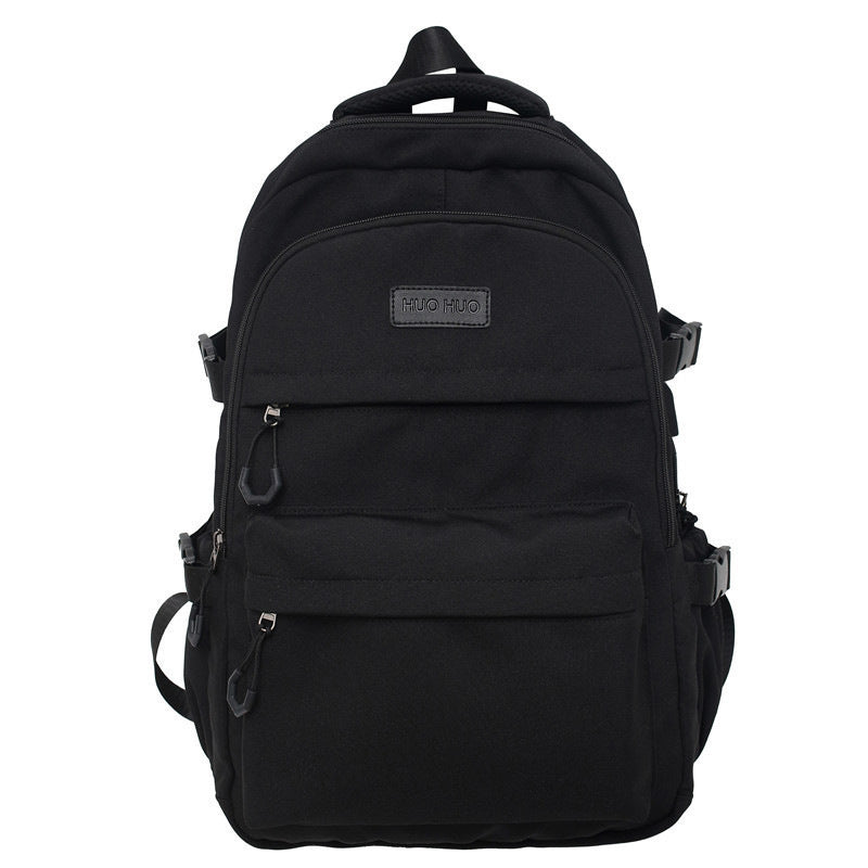 Unisex black everyday school backpack with multiple compartments & durable design for college students & daily carry.