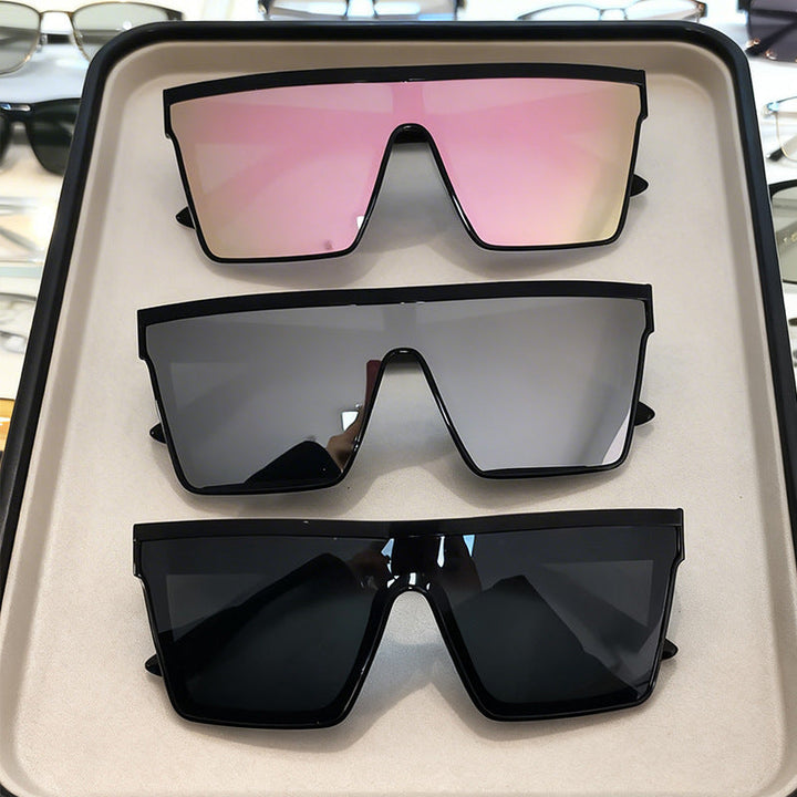 Bold rectangle sunglasses, unisex design with thick frames, perfect for a modern and stylish look. UV protected.