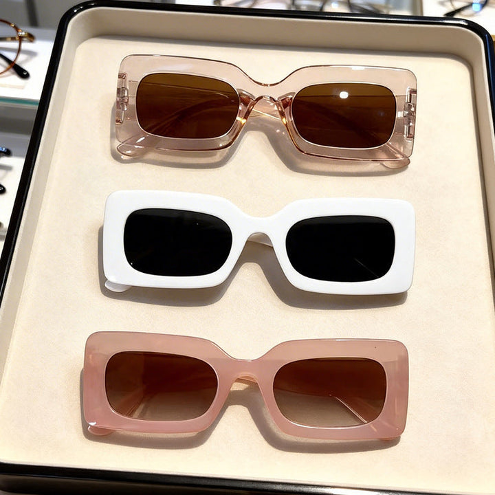 Modern unisex bold square sunglasses with UV protection. A durable retro eyewear fashion accessory for summer trends.