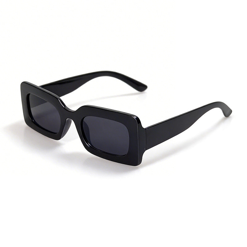 Stylish bold retro square sunglasses. Unisex fashion accessory for modern summer style. Durable eyewear with UV protection.