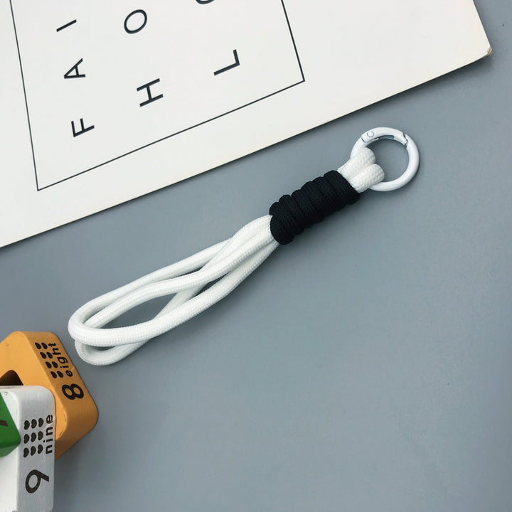 Secure braided key loop, ensuring your keys are always within reach and stylish.