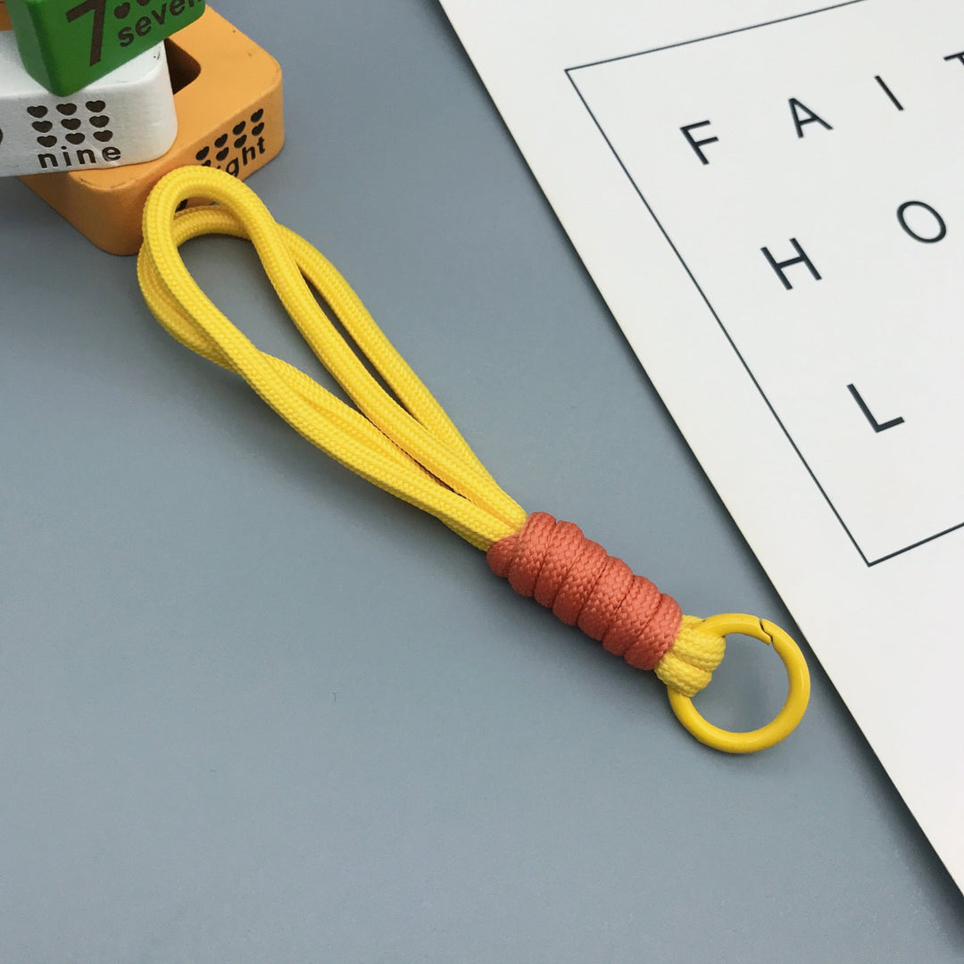 Colorful braided keychain, perfect for organizing keys or as a trendy bag charm.