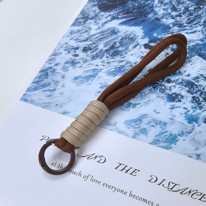 Modern braided key holder, adding a touch of style to your keys or purse.