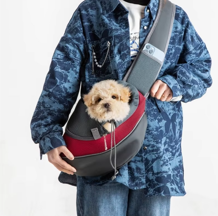 Unisex breathable pet carrier shoulder bag for small dogs & cats. Comfortable & hands-free travel accessory.