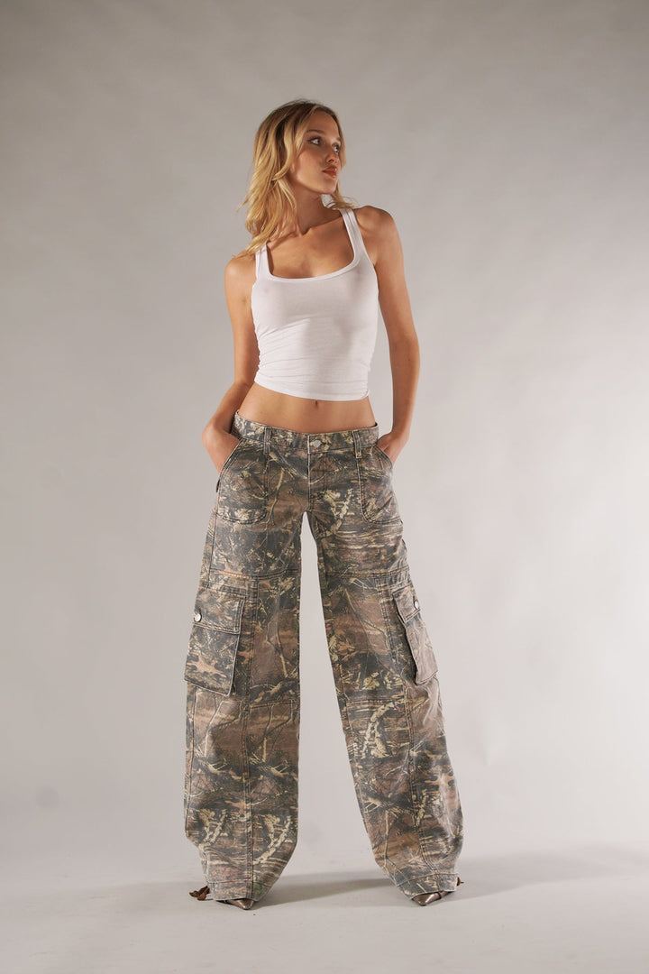 Comfortable unisex camo cargo pants, relaxed fit for women, versatile for street fashion or outdoors.