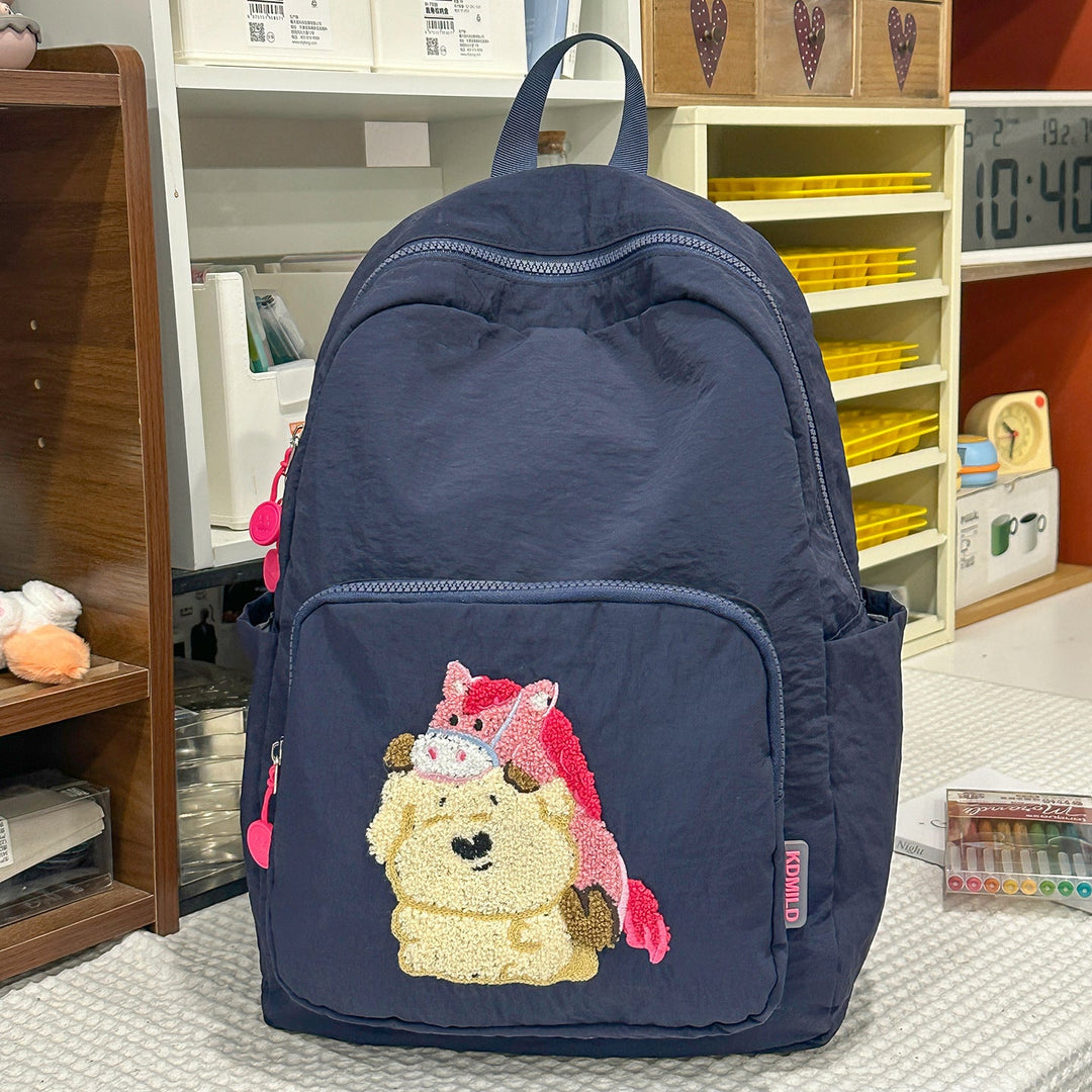 Unisex cartoon embroidered school backpack for kids & students. Perfect for daily use or travel.