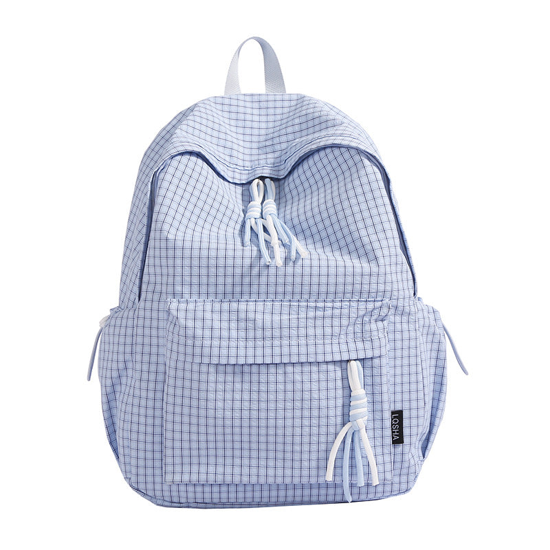 Stylish unisex backpack featuring a classic checked pattern, versatile for casual wear, school, or travel.