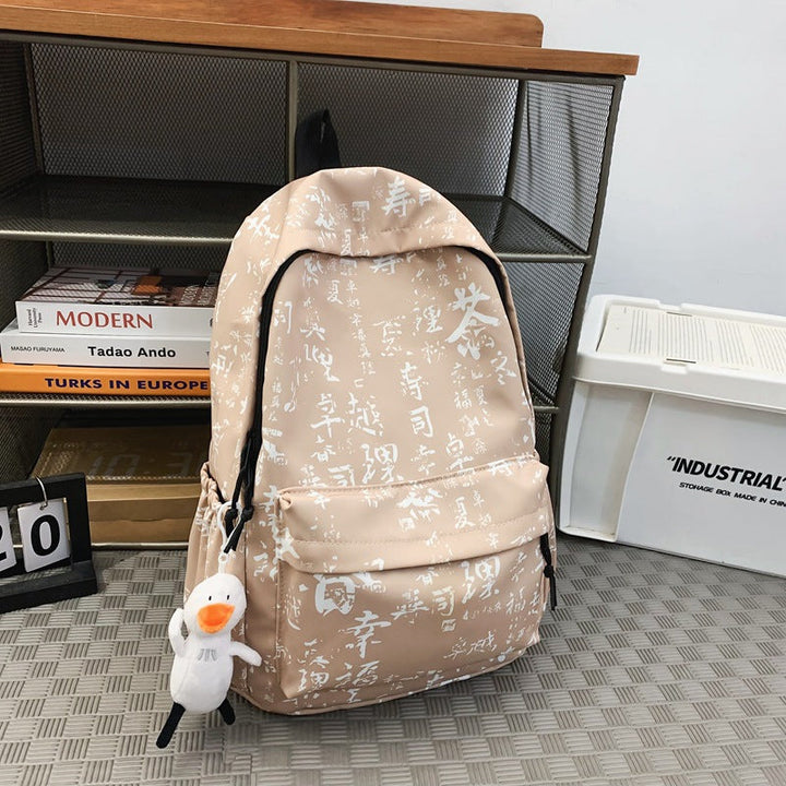Modern unisex backpack with an eye-catching artistic script pattern, great for students, travel, and casual outings.