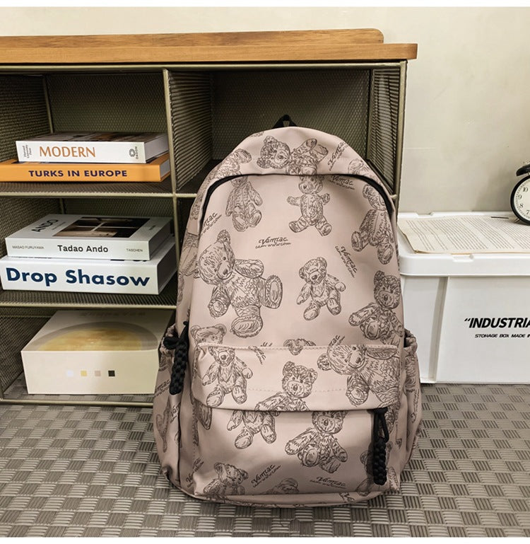 Stylish unisex teddy bear print backpack. Perfect for school, travel, or as a fun everyday casual bag.