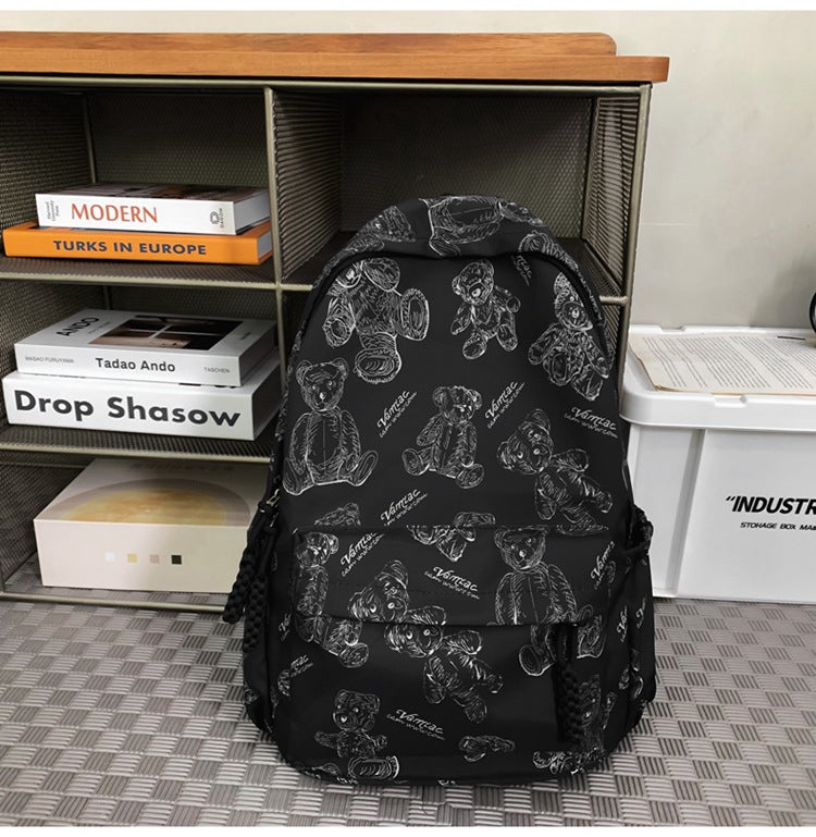 Cute teddy bear print backpack, a spacious unisex casual bag for students & travelers. Durable everyday use.