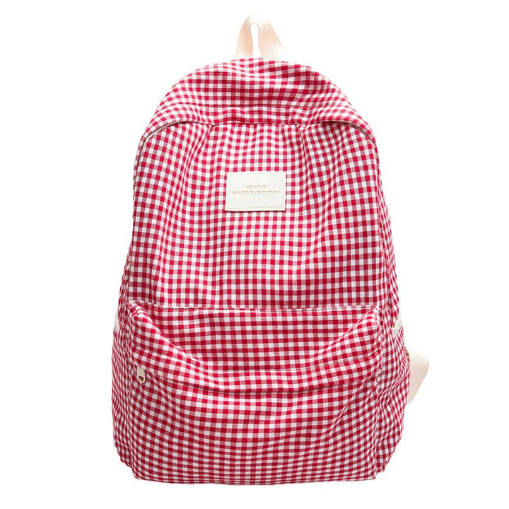 Spacious checked school backpack for unisex daily carry, made of canvas, great for students & light travel daypack.