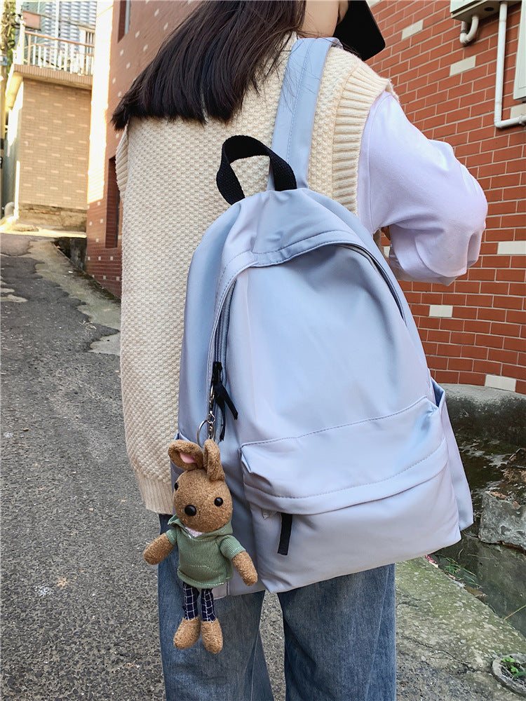 Stylish unisex everyday daypack with multiple compartments for organized storage, ideal for casual and travel use.
