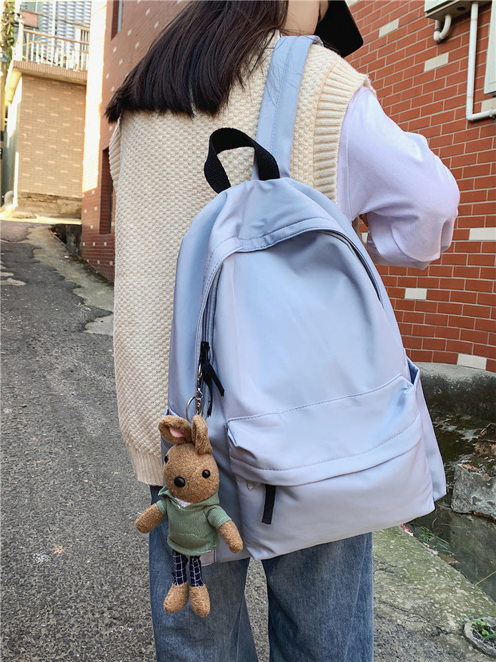 Stylish unisex everyday daypack with multiple compartments for organized storage, ideal for casual and travel use.