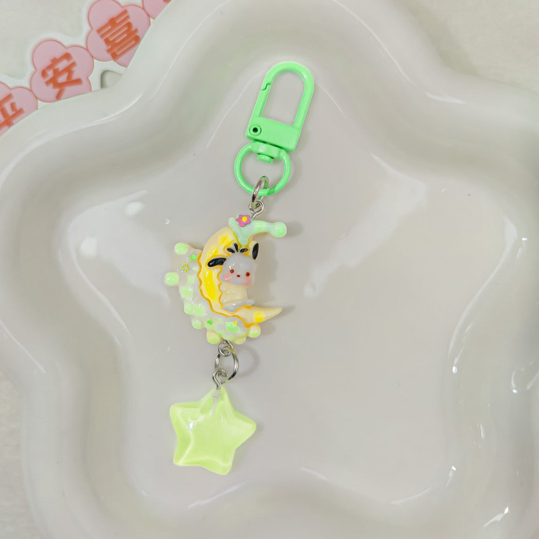 Versatile unisex bag & key charm. This durable plastic pendant keychain is a charming personal accessory.