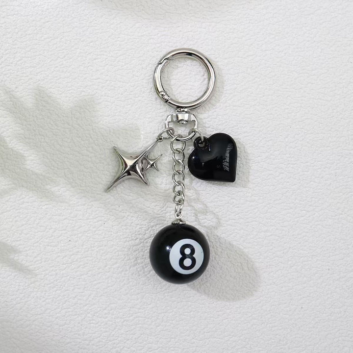 Unisex stylish metal charm, keychain pendant for bags & keys, modern accessory.
