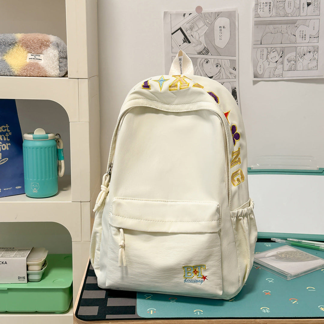 Embroidered classic travel backpack, a stylish & practical unisex commuter bag for urban adventures.