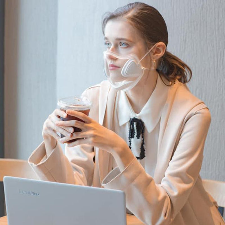 Reusable clear face shield with wide visor, compatible with Face ID & glasses for daily protection.