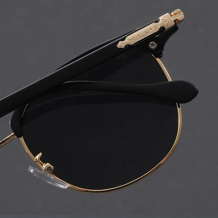 Unisex half-frame Clubmaster metal sunglasses, stylish fashion accessory with UV400 protection.