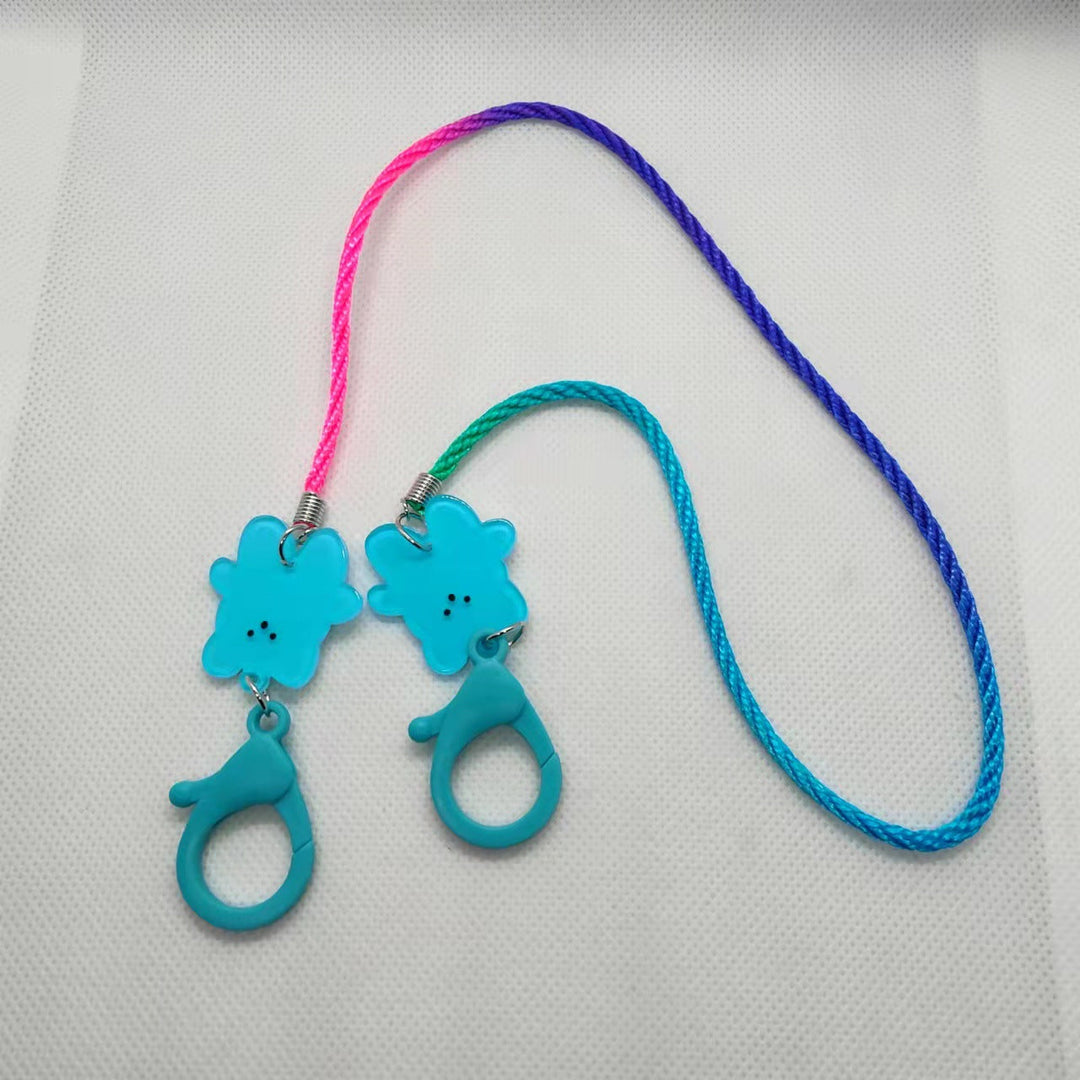 Unisex & kids colorful mask holder lanyard with playful charms, a hygienic and secure way to carry face masks.
