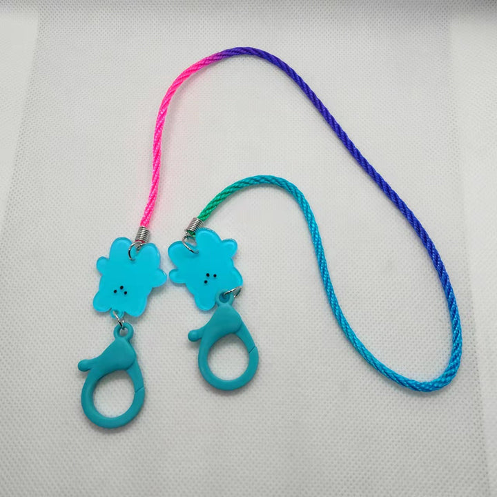 Unisex & kids colorful mask holder lanyard with playful charms, a hygienic and secure way to carry face masks.