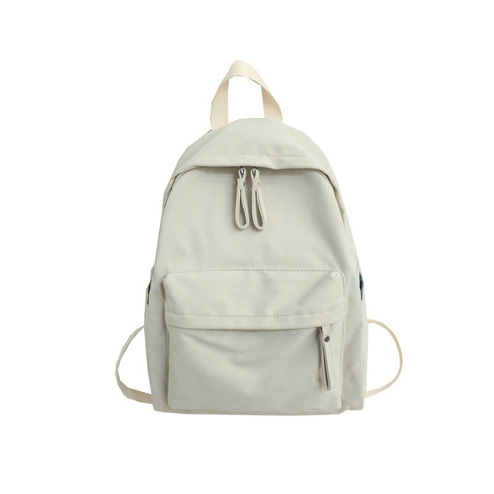 Versatile compact unisex travel backpack, ideal for daily commutes or light adventures, with a sleek, durable design.