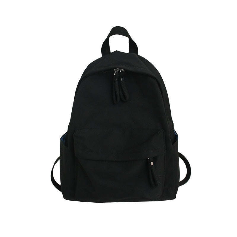 Durable compact rucksack, perfect for daily use & adventure travel. Unisex design with smart organization for essentials.