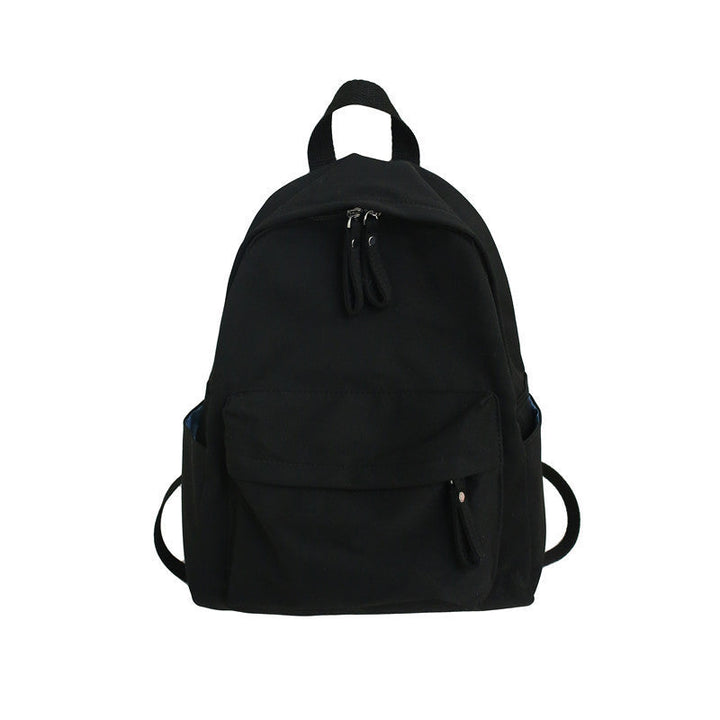 Durable compact rucksack, perfect for daily use & adventure travel. Unisex design with smart organization for essentials.