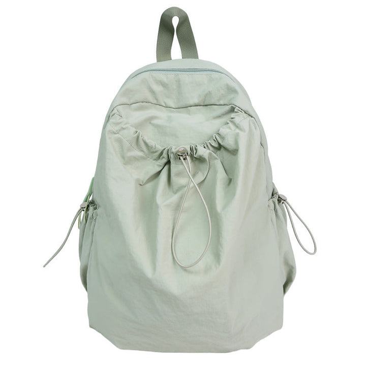 Lightweight drawstring backpack, perfect for gym, travel, or quick errands. Unisex design.