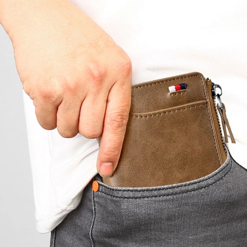 Unisex compact RFID blocking wallet in genuine leather for secure everyday carry.